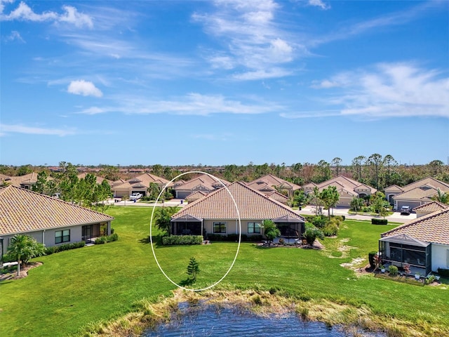 bird's eye view with a water view