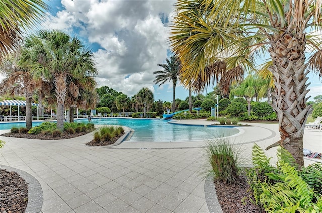 view of swimming pool featuring a patio