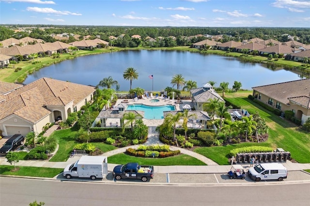 drone / aerial view featuring a water view