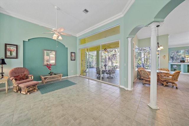 sitting room with ornamental molding, decorative columns, light tile patterned flooring, and ceiling fan