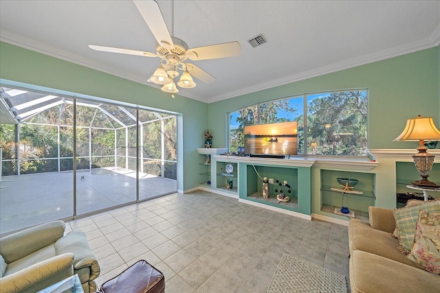 living room with crown molding, tile patterned floors, and ceiling fan