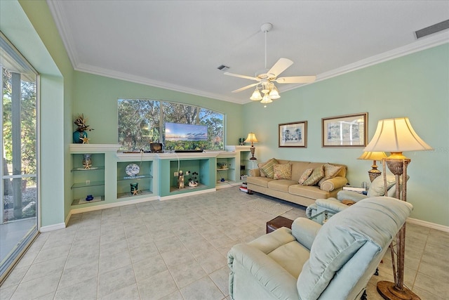 living room featuring ornamental molding, a healthy amount of sunlight, light tile patterned floors, and ceiling fan