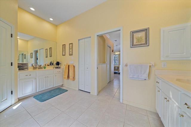 bathroom with vanity and tile patterned flooring