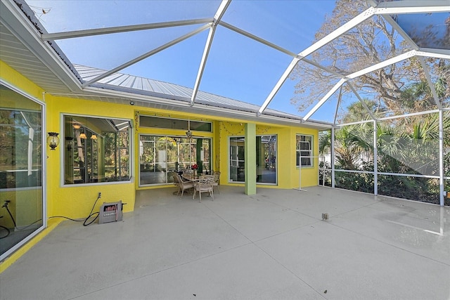 unfurnished sunroom featuring lofted ceiling