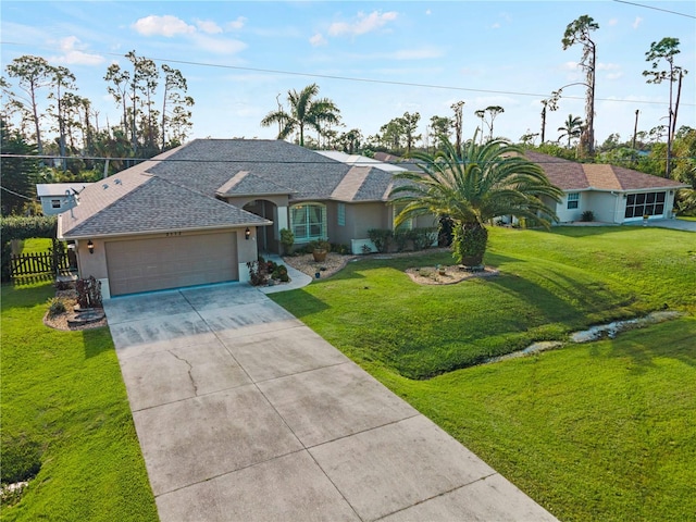 ranch-style home featuring a front yard and a garage