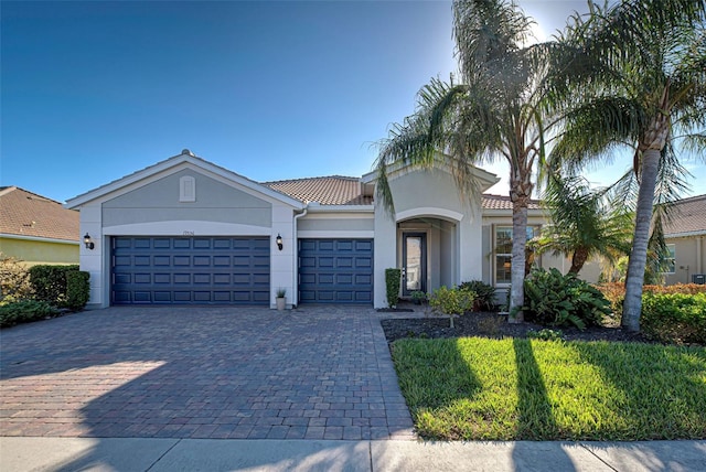 view of front of property featuring a garage