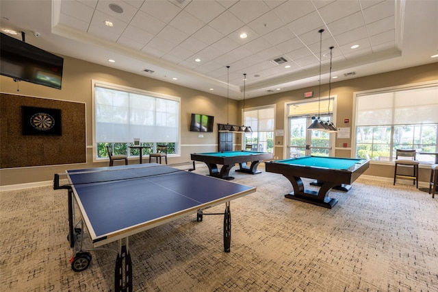 playroom featuring pool table, carpet floors, a tray ceiling, and a wealth of natural light