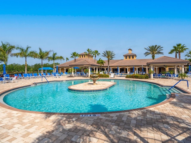 view of pool with a gazebo and a patio area