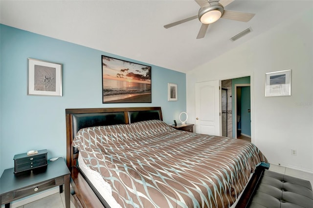 tiled bedroom featuring ceiling fan and vaulted ceiling