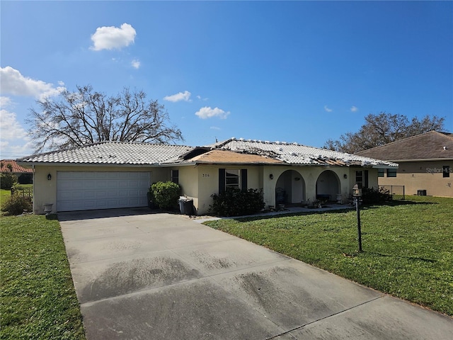 306 Signorelli Dr, Nokomis, FL 34275 - view of front of property featuring a front yard and a garage