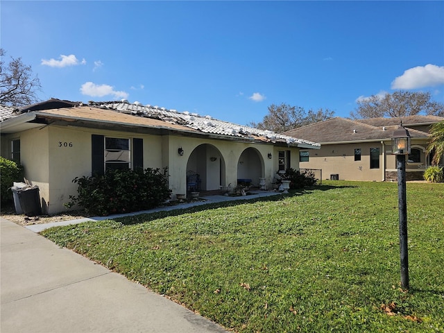 view of front of home with a front yard