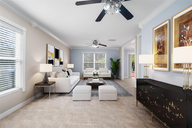 living room featuring light tile patterned floors, crown molding, a healthy amount of sunlight, and ceiling fan