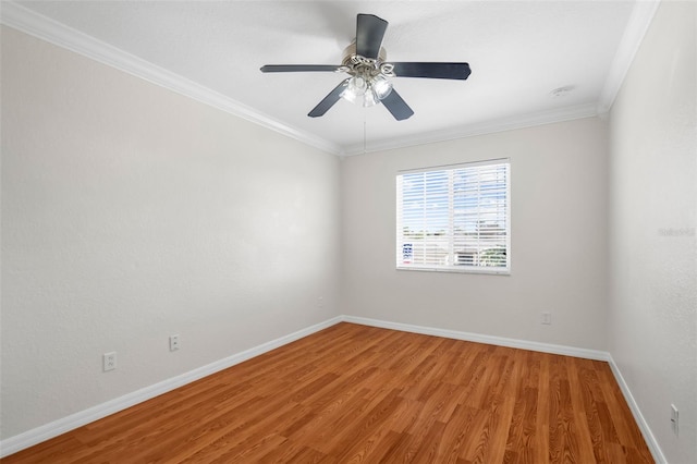 unfurnished room featuring ornamental molding, hardwood / wood-style floors, and ceiling fan