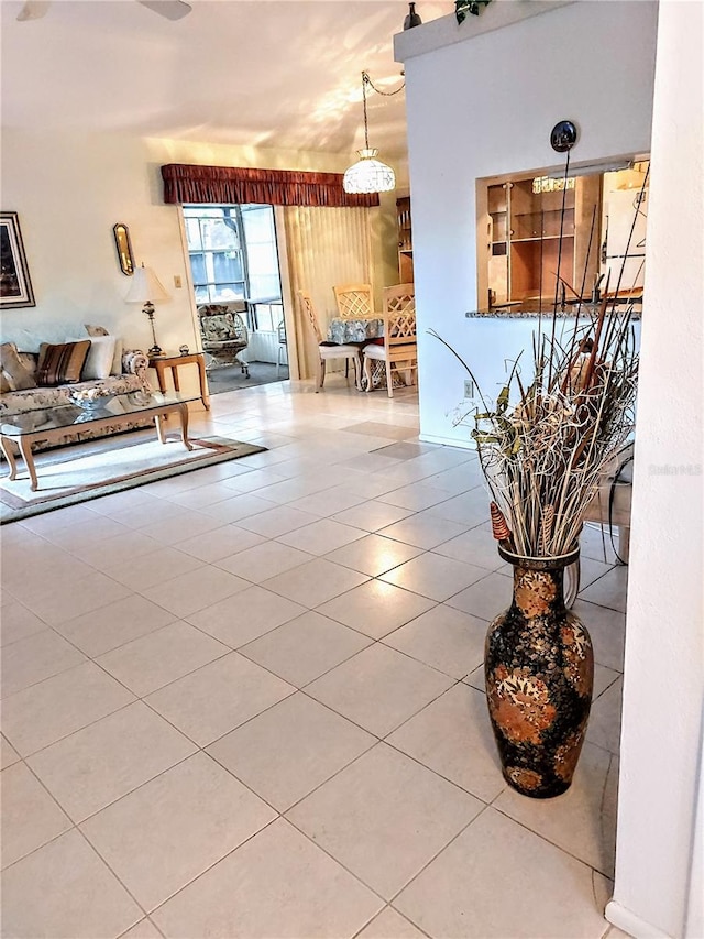 living room with tile patterned floors