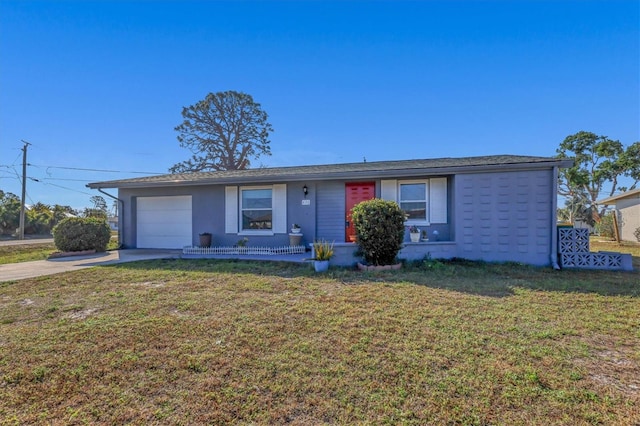 single story home with a front yard and a garage