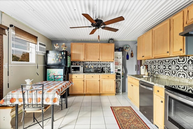 kitchen with sink, light brown cabinetry, backsplash, and stainless steel appliances