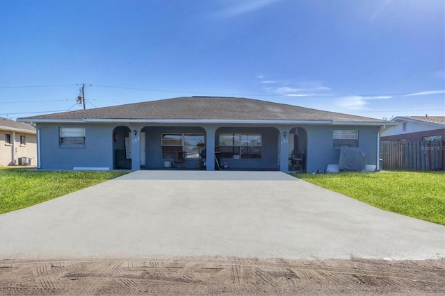 ranch-style home with a front yard and a porch