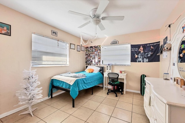 bedroom featuring light tile patterned floors and ceiling fan