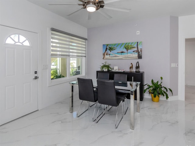 dining room featuring ceiling fan