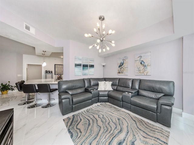 living room with a chandelier