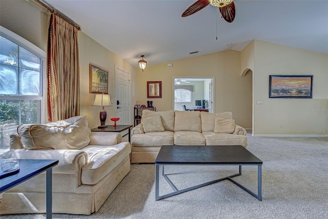 carpeted living room featuring lofted ceiling and ceiling fan