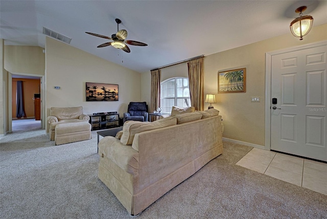 carpeted living room featuring ceiling fan and lofted ceiling