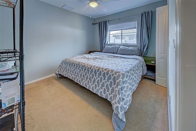 carpeted bedroom featuring ceiling fan