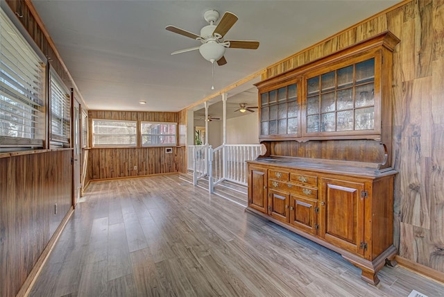 interior space featuring ceiling fan