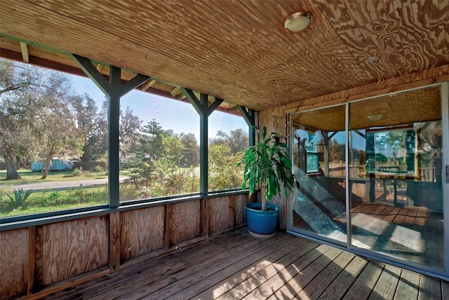 unfurnished sunroom featuring a healthy amount of sunlight