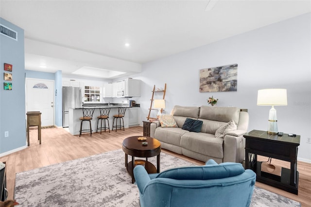 living room with light wood-type flooring