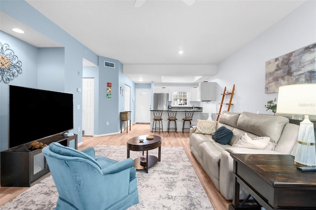 living room with light wood-type flooring