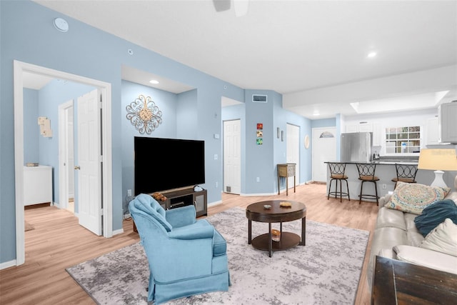 living room featuring light hardwood / wood-style flooring