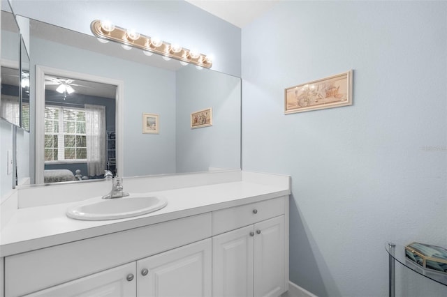 bathroom featuring vanity and ceiling fan