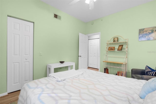 bedroom featuring ceiling fan and light wood-type flooring