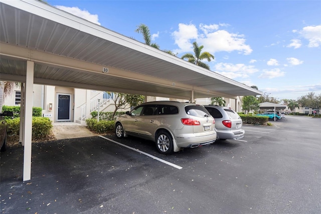 view of car parking with a carport