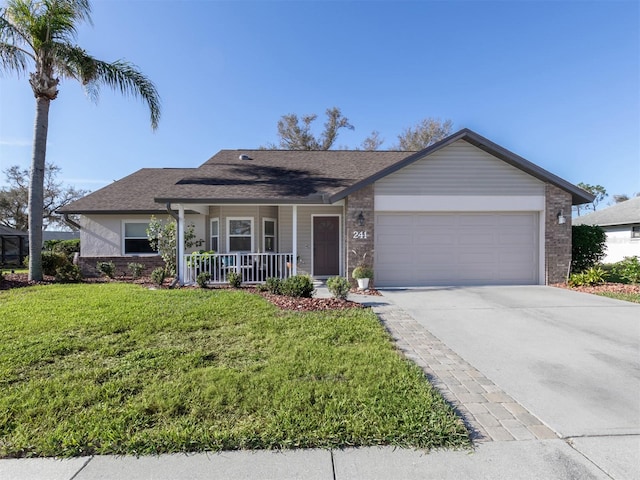 single story home featuring a garage, a front lawn, and a porch