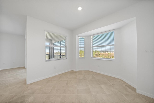 empty room featuring light tile patterned flooring