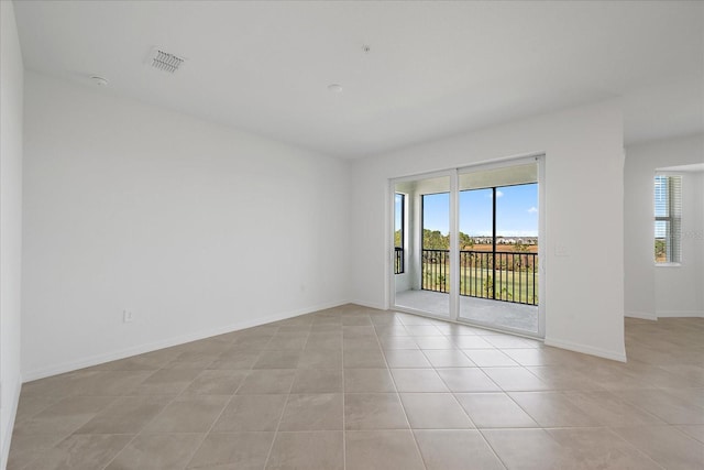 view of tiled spare room