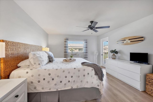 bedroom with access to outside, light hardwood / wood-style floors, and ceiling fan