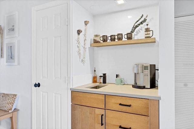 bar featuring sink