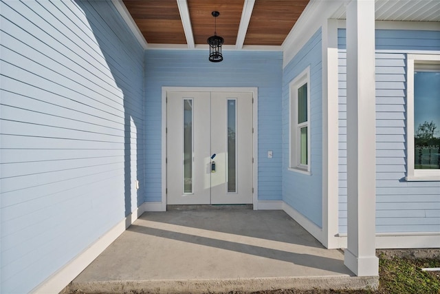 property entrance featuring french doors