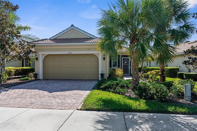 view of front of property with a garage