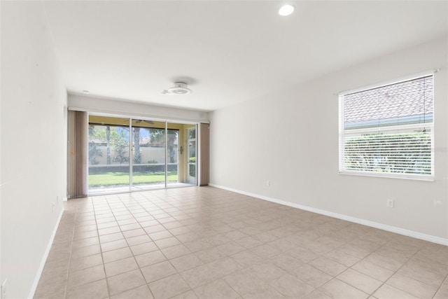 view of tiled spare room