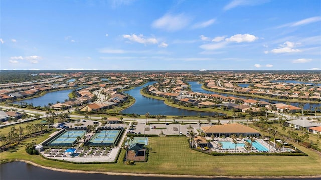 birds eye view of property featuring a water view