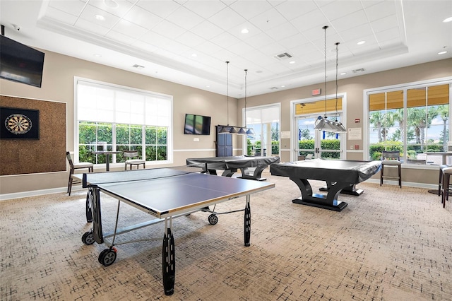 rec room featuring billiards, ornamental molding, and a tray ceiling