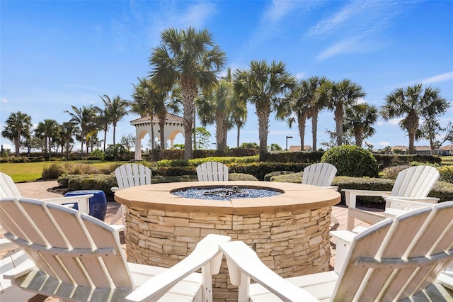 view of patio with an outdoor fire pit