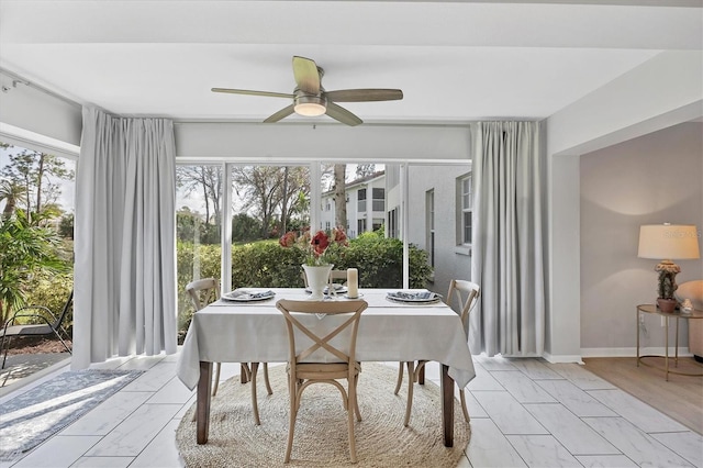 dining area featuring ceiling fan