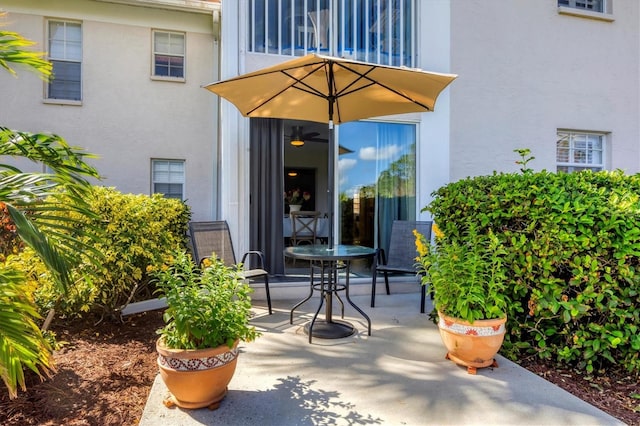 entrance to property featuring a patio