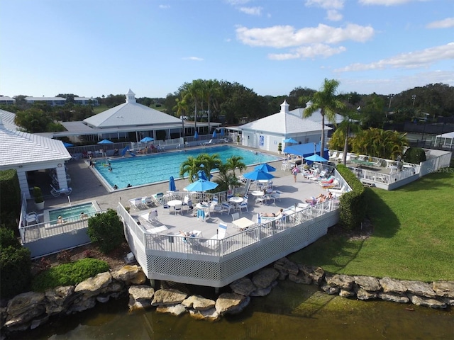 view of swimming pool featuring a patio