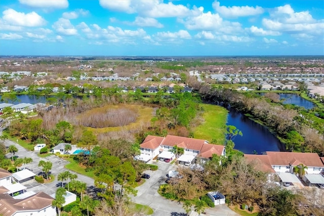 drone / aerial view with a water view